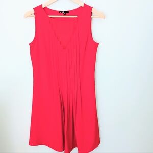 C. Luce Pleated Red Dress
